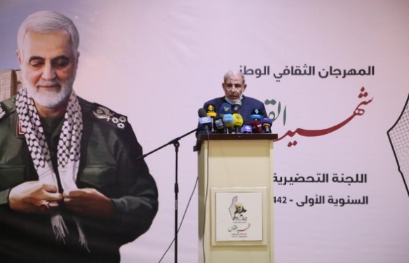 Senior Hamas official Mahmoud al-Azhar (right) and senior Palestinian Islamic Jihad official, Khaled al-Batash (left) give speeches at an event in Gaza commemorating Qasem Soleimani (PalToday, January 4, 2021)