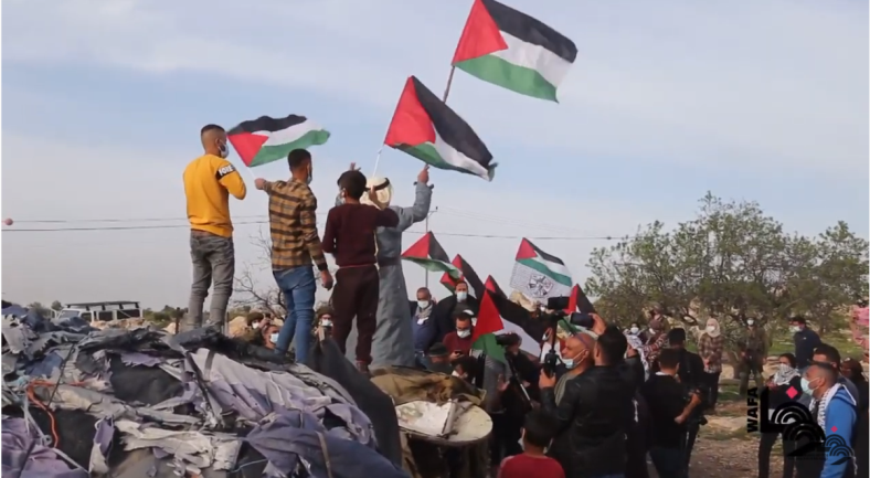 Palestinians demonstrate against Netanyahu's visit to Susiya (Wafa on YouTube, March 14, 2021).