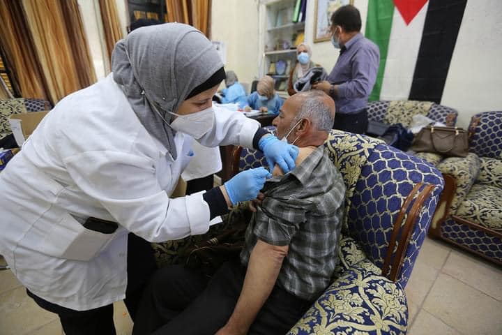 Palestinian medical personnel receive the vaccine (ministry of health in Ramallah Facebook page, April 5, 2021). 