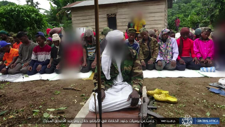 ISIS operatives in the Congo praying. 