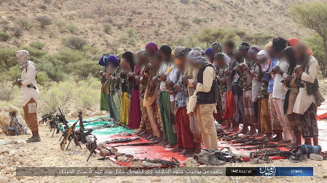 ISIS operatives in Somalia praying. 