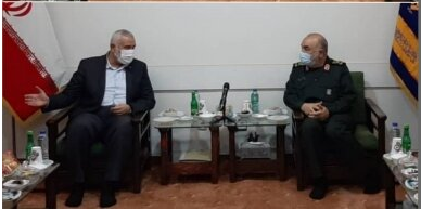 Isma'il Haniyeh (left) with the Hossein Salami, commander of the Iranian Revolutionary Guards Corps. 