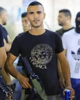 Alaa Zayud, armed with an assault rifle (Facebook page of Sair, September 30, 2021). 