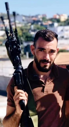 Abd al-Rahman Hani Subhi ''Abed, armed with a rifle (Hafez 'Abed's Facebook page, September 14, 2022). 