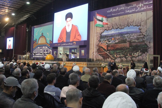 Nasrallah delivers the keynote address at the event (al-'Ahad website, April 14, 2023).