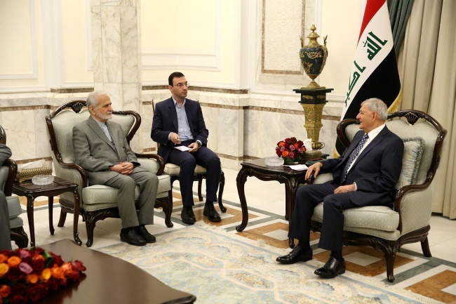 The president of Iraq (right) meets with the head of Iran's Strategic Council on Foreign Relations (IRNA, June 20, 2023).