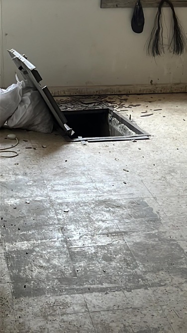 Underground space in the floor of a mosque in the Jenin refugee camp found to contain weapons and explosives (IDF spokesman's Twitter account, July 3, 2023).