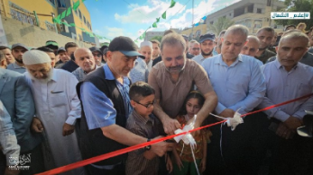 Abu Anas al-Ghandour, commander of the northern Gaza Strip Brigade (wearing the black cap), a member of Hamas' political bureau, Suheil al-Hindi and Musheir al-Masri cut the ribbon to open the exhibition in the northern Gaza Strip (Telegram channel of photojournalist Anas al-Sharif, July 1, 2023).