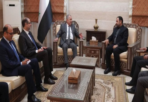 Meeting of the Syrian prime minister and the Iran ambassador in Damascus (Fars, June 27, 2023).