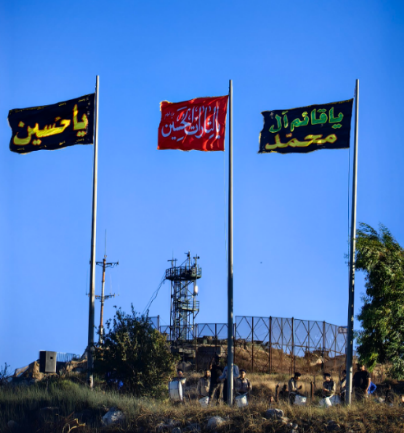 Shi'ite flags in front of an IDF post (Ali Shoeib's Twitter account, August 4, 2023)