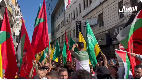 A march in Ramallah. Fatah and PFLP flags can also be seen (QudsN X Account, November 10, 2023).