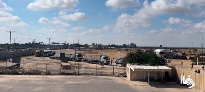 Humanitarian aid trucks enter the Palestinian side of the Rafah Crossing (Wafa YouTube channel, November 18, 2023)