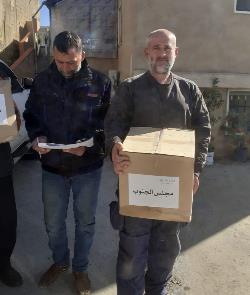 Distribution of aid packages in Markaba (Facebook page of the town of Markaba, December 11, 2023) 