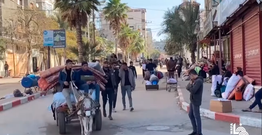 Residents evacuate the al-Bureij refugee camp (Wafa YouTube channel, December 26, 2023)