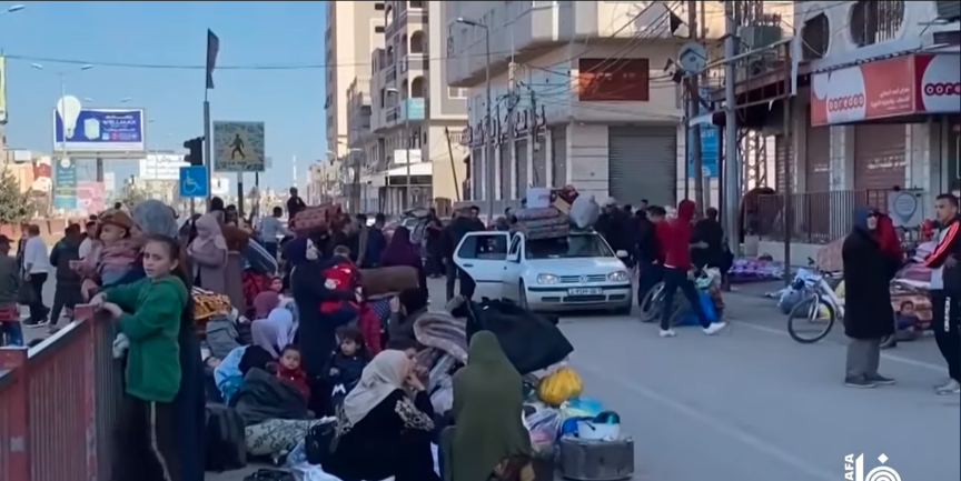 Residents evacuate the al-Bureij refugee camp (Wafa YouTube channel, December 26, 2023)