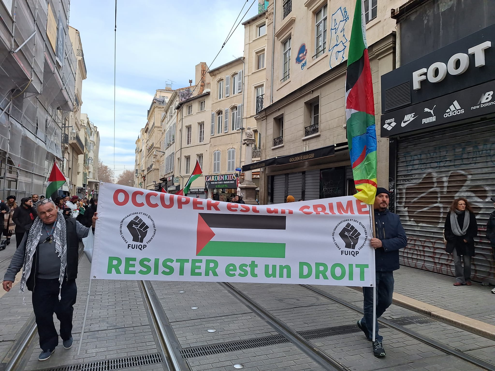 FUIQP demonstration. The banner reads, 