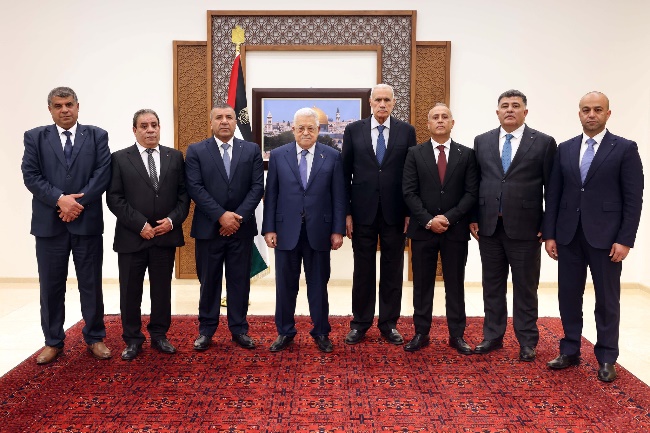 The six new district governors after being sworn in in Mahmoud Abbas' office in Ramallah (Mahmoud Abbas' Facebook page, March 9, 2024)