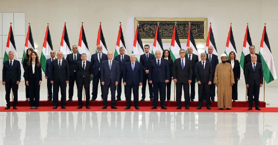 The new Palestinian government after the swearing and in ceremony in Ramallah.