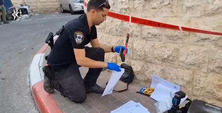 The axe found in the terrorists' vehicle (Israel Police Force spokesperson's unit, April 22, 2024)