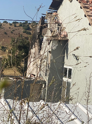 Damage to a house in Moshav Avivim (Marom HaGalil spokesman's unit, May 26, 2024)