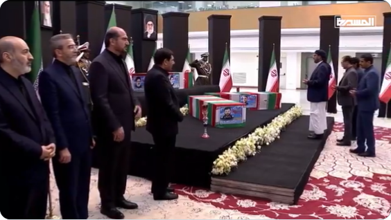 Houthi delegation near the coffins of senior Iranian officials (al-Masirah, May 22, 2024)