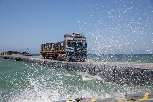 Trucks on the pier (CENTCOM X account, June 15, 2024)