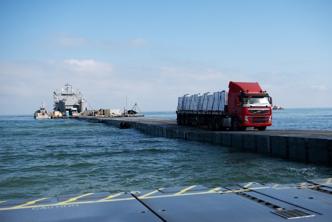  Trucks on the pier (CENTCOM X account, June 15, 2024)