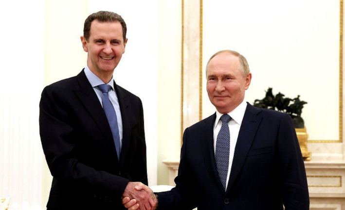 Assad and Putin shake hands (Syrian president's Telegram channel, July 25, 2024)