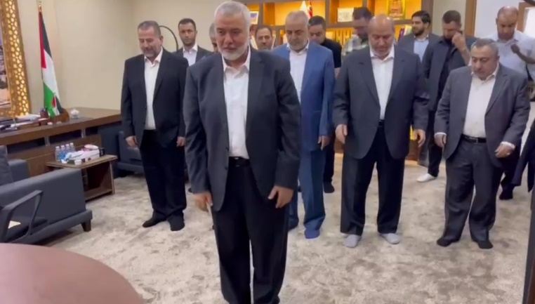 Haniyeh and Hamas figures at prayer on October 7, 2023, offering thanks to Allah (Hamas Telegram channel, October 7, 2023)