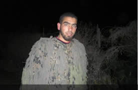 Ismail al-Teli, Izz al-Din al-Qassam Brigades terrorist operative, wears a camouflage uniform. He was killed in an IDF aerial strike in the northern Gaza Strip (Filastin al-'Aan, October 24, 2012).