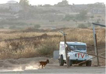 The jeep, marked ''Press" and ''TV'' used by the terrorist squad to drive to the site of the attack (Photo courtesy of Maor Azoulai and Yedioth Aharonoth, June 2007).